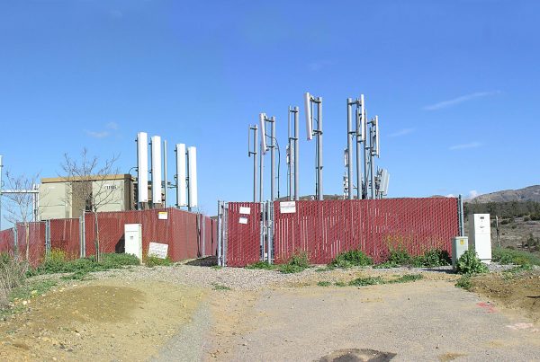 Cell Towers Behind Fence